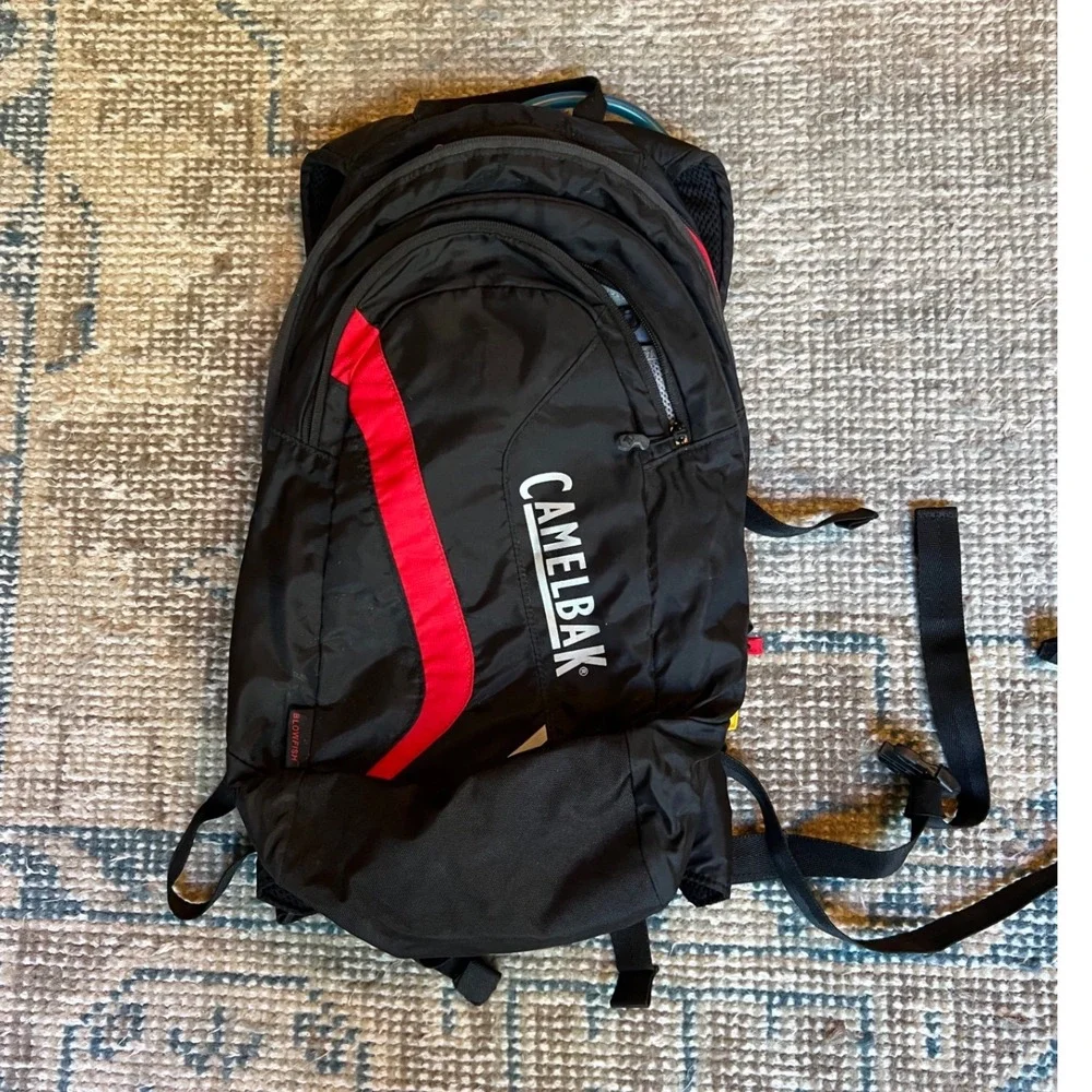 CamelBak Blowfish Hydration Pack Backpack Black Red Expandable Hiking Cycling